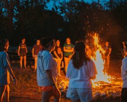 Camp-Peniel-Resident-Camp-Campers-Around-the-Fire-square